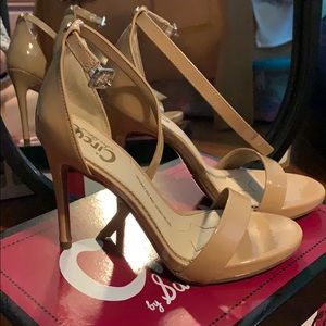 Nude open toed heels